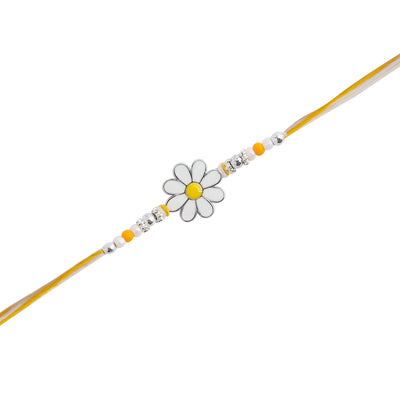 yellow rakhi featuring a delicate floral design