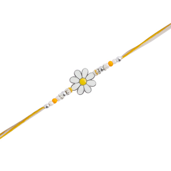 yellow rakhi featuring a delicate floral design
