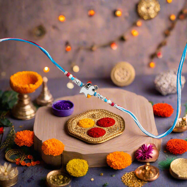 elegant blue rakhi featuring a charming, cute puppy design