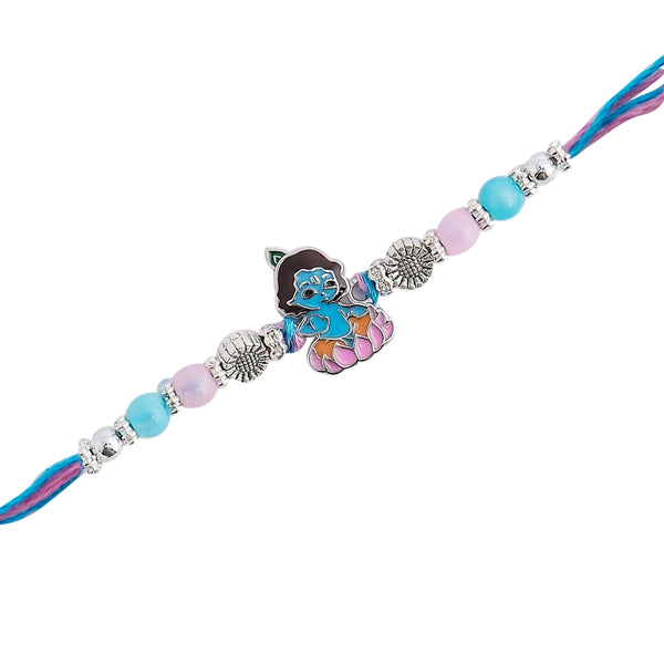 blue rakhi featuring a delicate Krishna motif.