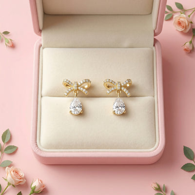 92.5 Fine Silver Gold-Plated Sparkling Zirconia Bow Drop Stud Earrings