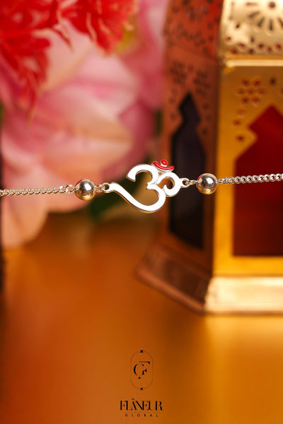 Raksha Bandhan with this exquisite Om Spacil Rakhi adorned