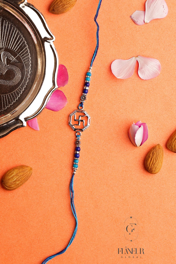 Rakhi with this exquisite silver piece